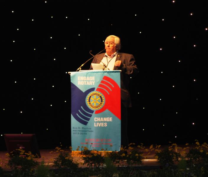 Trustee John Miles addresses D1130 District Conference